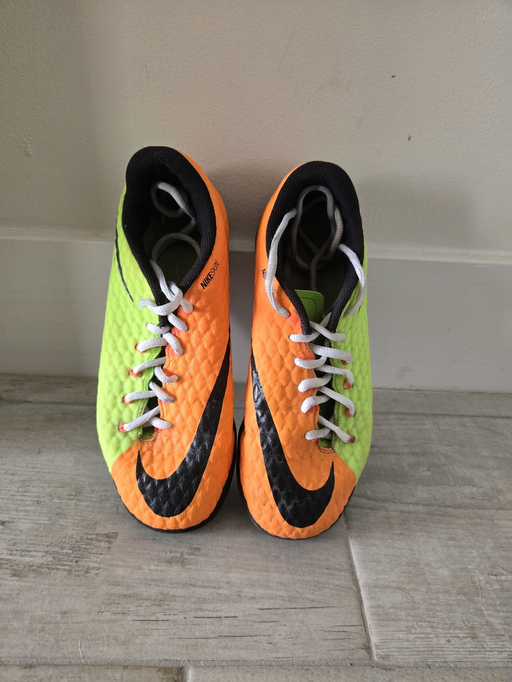 Nike Kids' Soccer Shoes in Neon Orange and Green